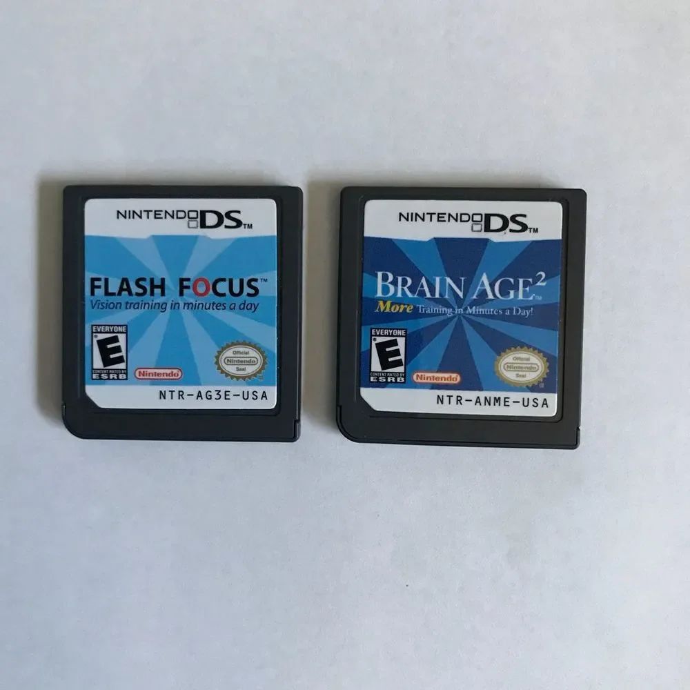 Nintendo ds two game cartridges brain age and flash focus
